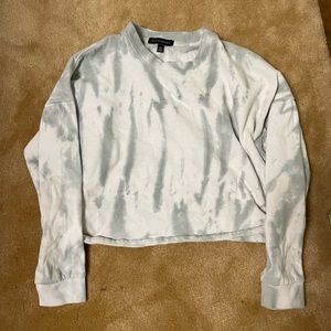 Green and white tie-die cropped sweatshirt.